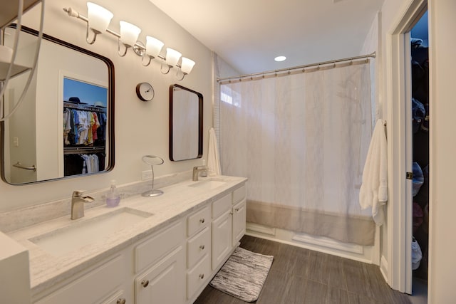 7830 Legacy Park Ct, Chattanooga, TN 37421 - full bathroom with a walk in closet, double vanity, and recessed lighting
