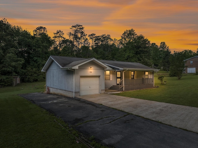 2126 Millard Rd, Soddy Daisy, TN 37379 - single story home featuring covered porch, a garage, a lawn, and driveway