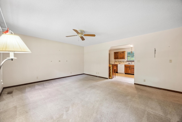 2126 Millard Rd, Soddy Daisy, TN 37379 - empty room with ceiling fan, light carpet, arched walkways, and baseboards