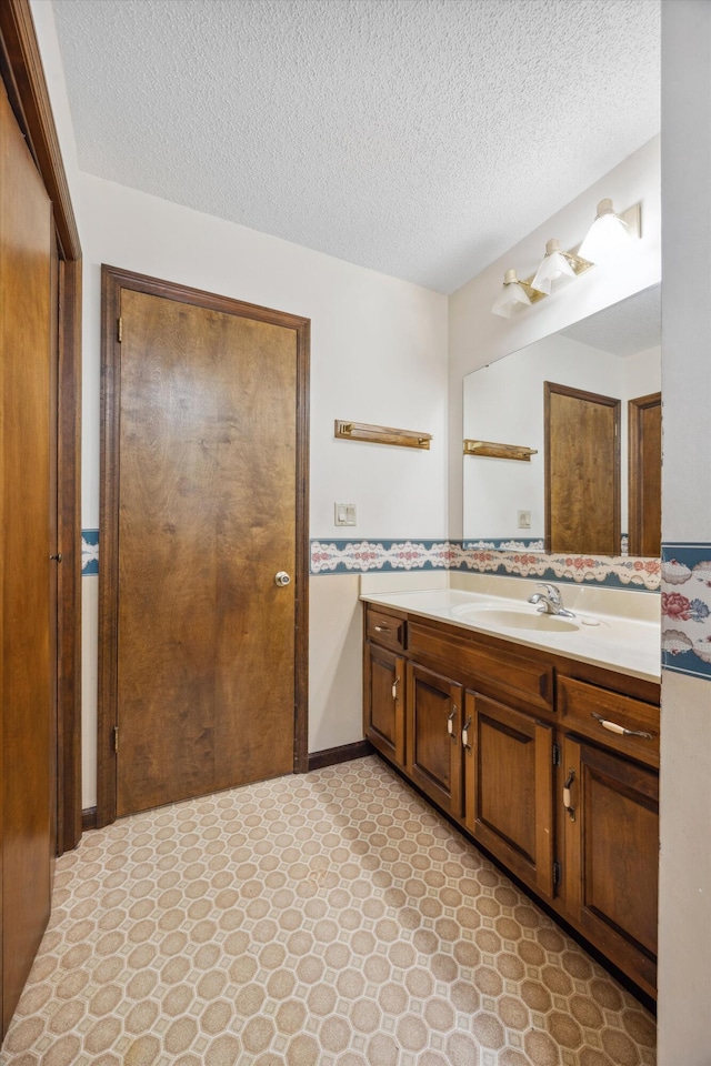 2126 Millard Rd, Soddy Daisy, TN 37379 - bathroom featuring vanity and a textured ceiling