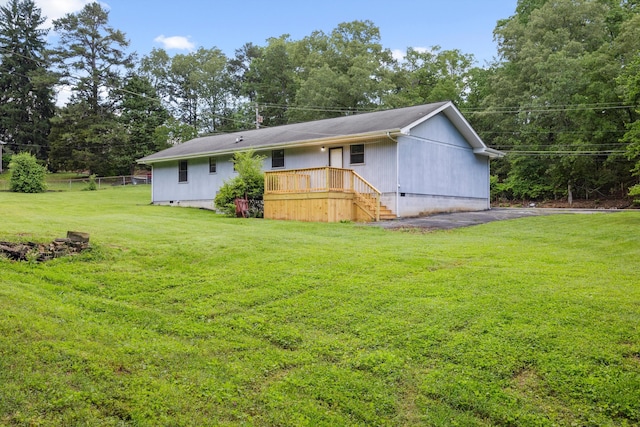 2126 Millard Rd, Soddy Daisy, TN 37379 - back of property featuring a lawn, stairway, and a deck