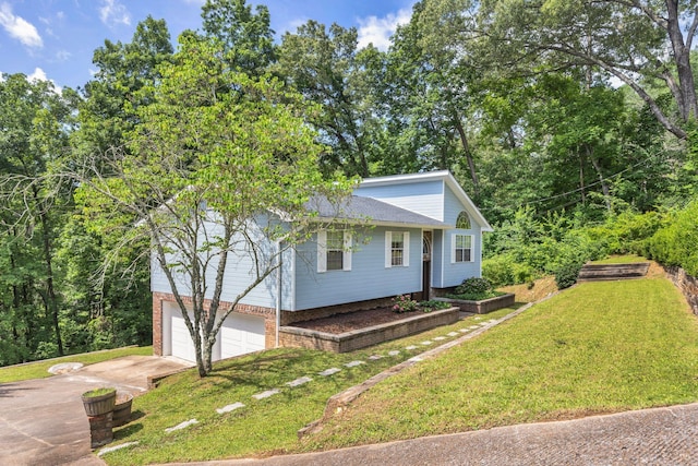 216 Longview Dr, Rossville, GA 30741 - view of front of property featuring driveway, an attached garage, a front lawn, and brick siding
