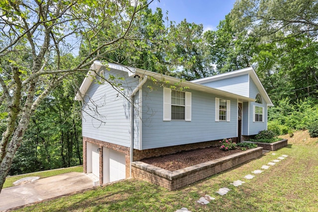 216 Longview Dr, Rossville, GA 30741 - view of front facade with a garage and concrete driveway
