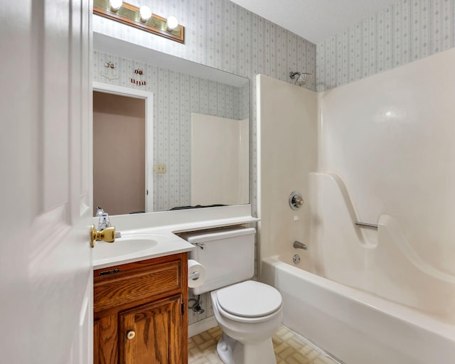 216 Longview Dr, Rossville, GA 30741 - full bath with wallpapered walls, vanity, tub / shower combination, and toilet
