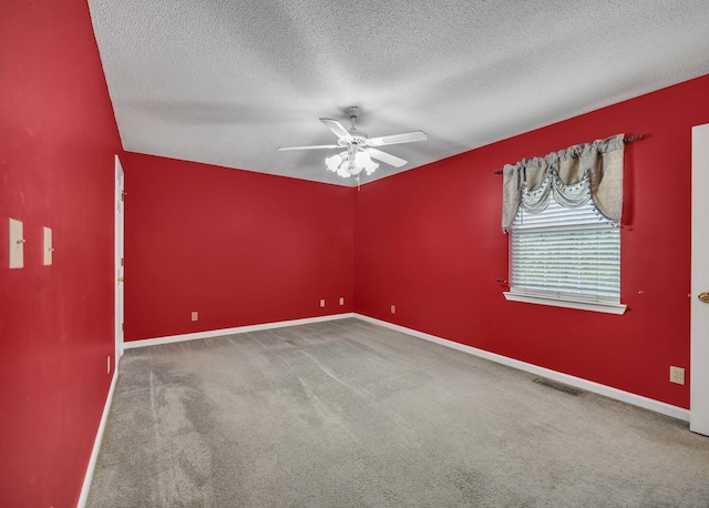 216 Longview Dr, Rossville, GA 30741 - empty room featuring a ceiling fan, carpet floors, a textured ceiling, and baseboards