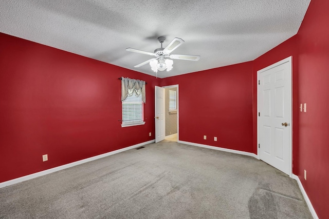 216 Longview Dr, Rossville, GA 30741 - unfurnished room with carpet flooring, a ceiling fan, baseboards, and a textured ceiling