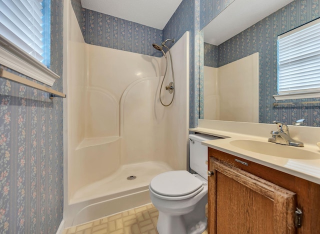 216 Longview Dr, Rossville, GA 30741 - full bath featuring wallpapered walls, a shower, toilet, vanity, and brick patterned floors