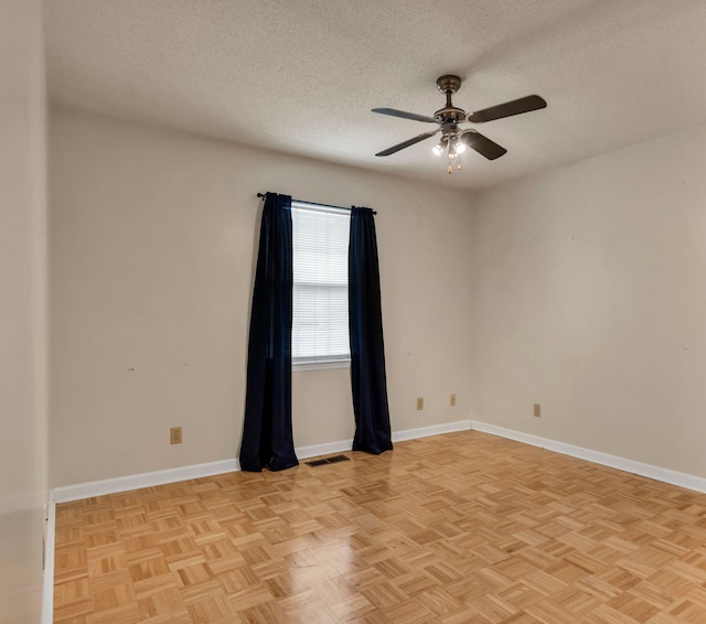 216 Longview Dr, Rossville, GA 30741 - unfurnished room featuring a textured ceiling, a ceiling fan, and baseboards