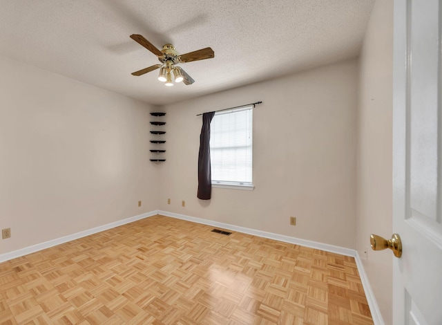 216 Longview Dr, Rossville, GA 30741 - unfurnished room featuring a textured ceiling, ceiling fan, and baseboards