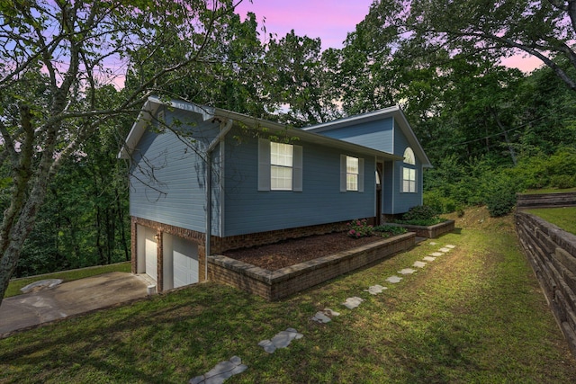 216 Longview Dr, Rossville, GA 30741 - view of side of property featuring a garage, driveway, and a yard