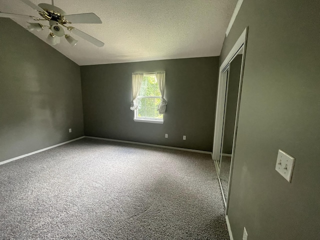 6206 Sagefield Dr, Harrison, TN 37341 - empty room with a ceiling fan, carpet floors, a textured ceiling, baseboards, and lofted ceiling