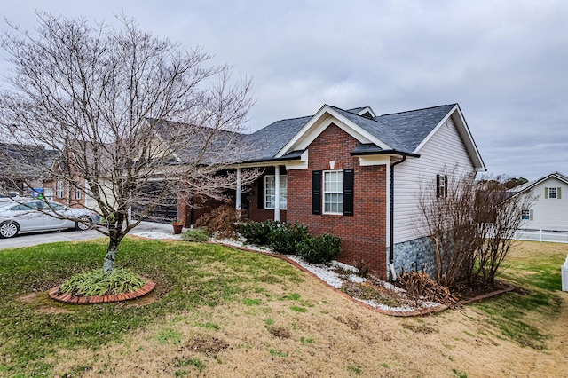 214 Fyke Dr, Athens, TN 37303 - ranch-style house with a front yard, brick siding, and roof with shingles