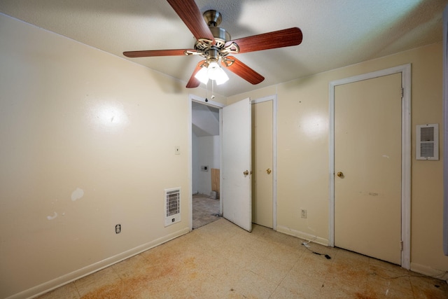 1002 Gillespie Rd, Chattanooga, TN 37411 - unfurnished bedroom with baseboards and a ceiling fan