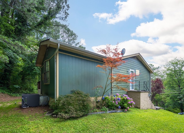 1002 Gillespie Rd, Chattanooga, TN 37411 - view of home's exterior featuring a lawn and a central air condition unit