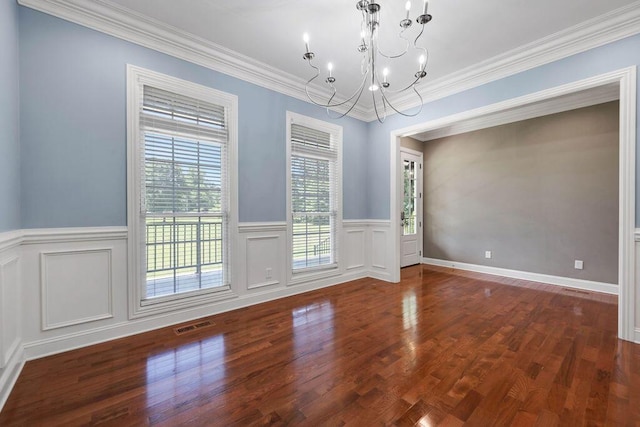 5820 Trion Teloga Rd, Summerville, GA 30747 - unfurnished dining area with a chandelier, wood finished floors, a wainscoted wall, crown molding, and a decorative wall