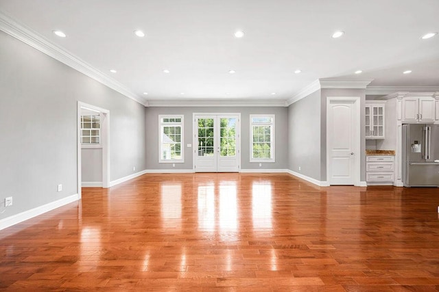 5820 Trion Teloga Rd, Summerville, GA 30747 - unfurnished living room featuring light wood finished floors, baseboards, crown molding, and recessed lighting