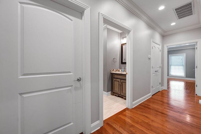 5820 Trion Teloga Rd, Summerville, GA 30747 - hallway with light wood-style floors, crown molding, baseboards, and recessed lighting