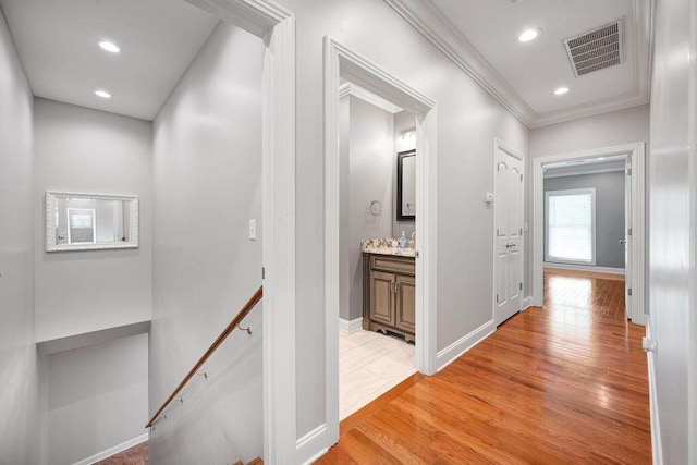 5820 Trion Teloga Rd, Summerville, GA 30747 - corridor with an upstairs landing, light wood finished floors, crown molding, baseboards, and recessed lighting