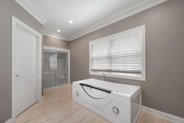 5820 Trion Teloga Rd, Summerville, GA 30747 - bathroom featuring washer and dryer, ornamental molding, a jetted tub, a shower stall, and baseboards
