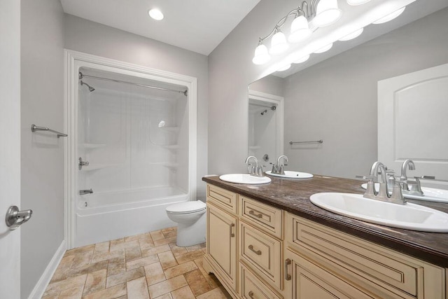 5820 Trion Teloga Rd, Summerville, GA 30747 - bathroom featuring toilet, double vanity, stone finish floors,  shower combination, and baseboards