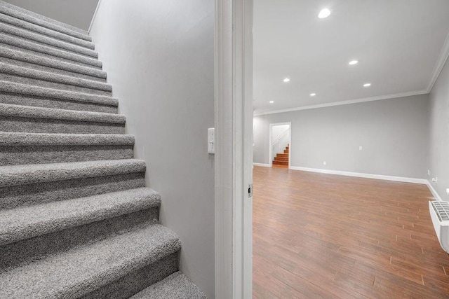 5820 Trion Teloga Rd, Summerville, GA 30747 - stairway featuring crown molding, wood finished floors, recessed lighting, and baseboards