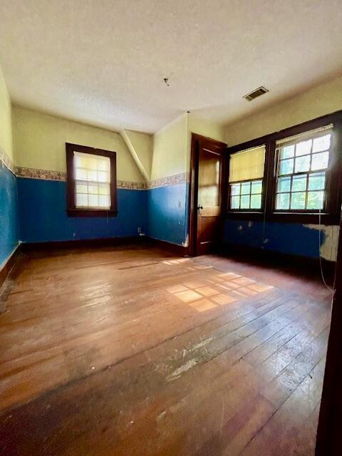 4908 13th Ave, Chattanooga, TN 37407 - empty room featuring wood-type flooring and baseboards