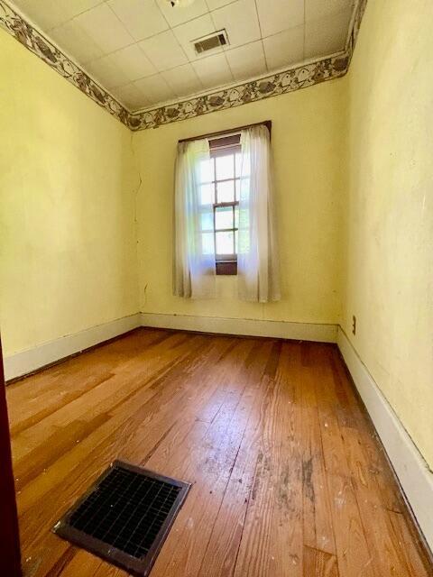 4908 13th Ave, Chattanooga, TN 37407 - spare room featuring hardwood / wood-style floors and baseboards