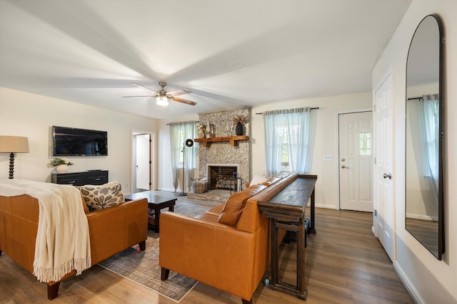 142 Holli Bird Ln, Ringgold, GA 30736 - living area featuring a fireplace, wood finished floors, a ceiling fan, and baseboards