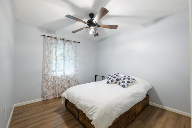 142 Holli Bird Ln, Ringgold, GA 30736 - bedroom featuring baseboards, wood finished floors, and a ceiling fan