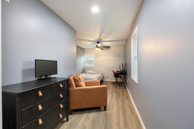 142 Holli Bird Ln, Ringgold, GA 30736 - living area featuring light wood-type flooring, a ceiling fan, and baseboards