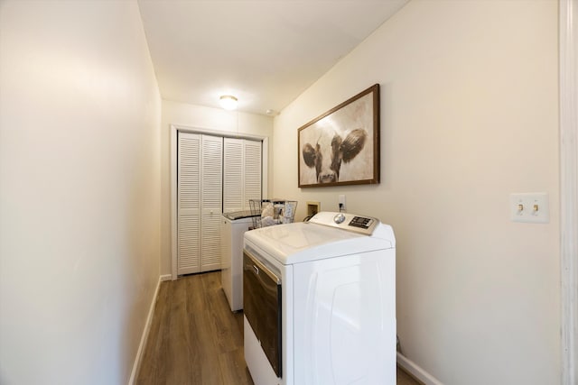 142 Holli Bird Ln, Ringgold, GA 30736 - washroom featuring washer / clothes dryer, baseboards, and wood finished floors