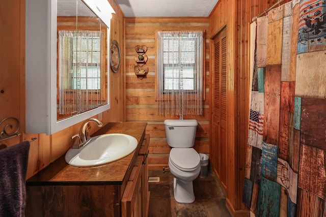 4306 Fredonia Rd, Dunlap, TN 37327 - full bathroom featuring wood walls, toilet, and vanity