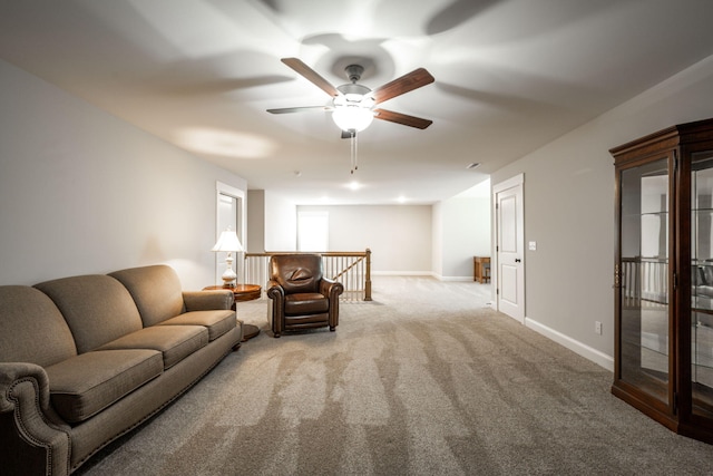 8647 Kensley Ln, Hixson, TN 37343 - living area with ceiling fan, carpet floors, and baseboards