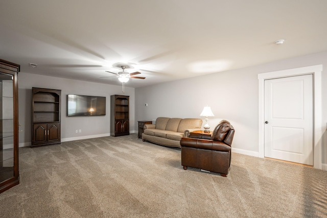 8647 Kensley Ln, Hixson, TN 37343 - carpeted living area featuring a ceiling fan and baseboards