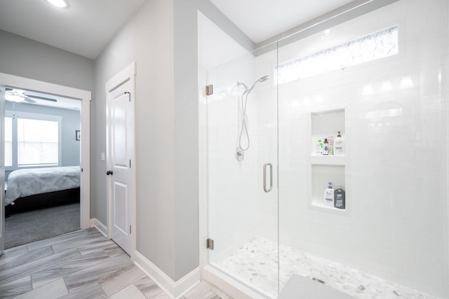 8647 Kensley Ln, Hixson, TN 37343 - full bath with a stall shower, ensuite bath, baseboards, and a ceiling fan