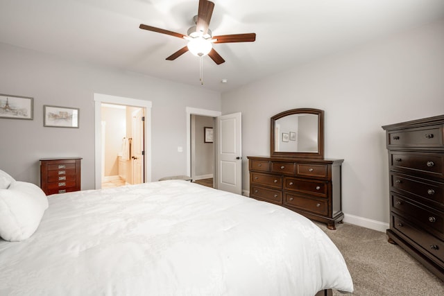 8647 Kensley Ln, Hixson, TN 37343 - bedroom featuring baseboards, light carpet, ensuite bath, and ceiling fan