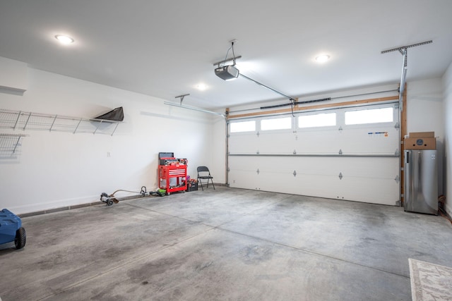 8647 Kensley Ln, Hixson, TN 37343 - garage featuring a garage door opener