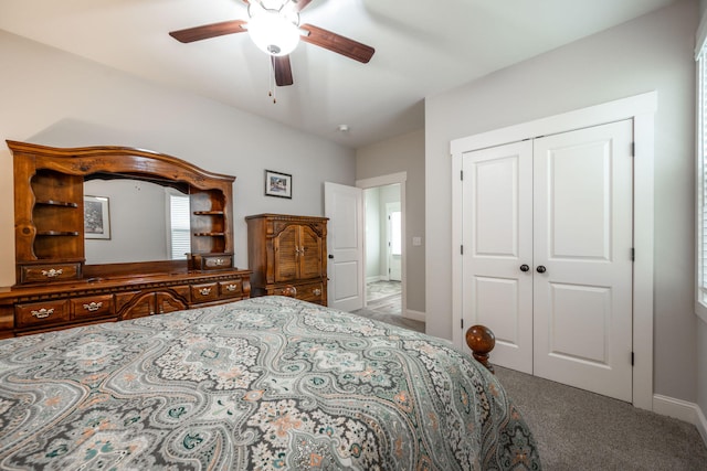 8647 Kensley Ln, Hixson, TN 37343 - carpeted bedroom with a closet, baseboards, and a ceiling fan