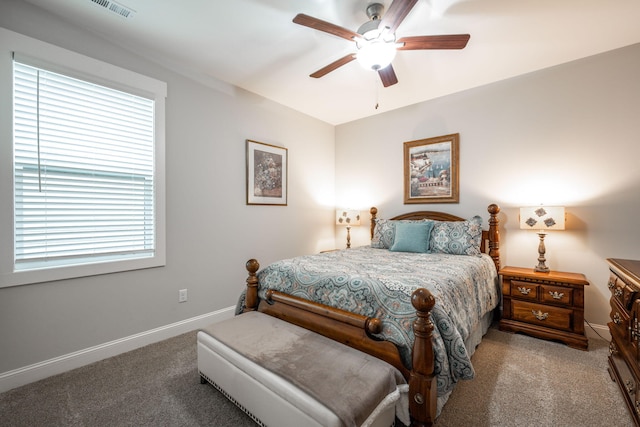 8647 Kensley Ln, Hixson, TN 37343 - carpeted bedroom featuring baseboards and a ceiling fan