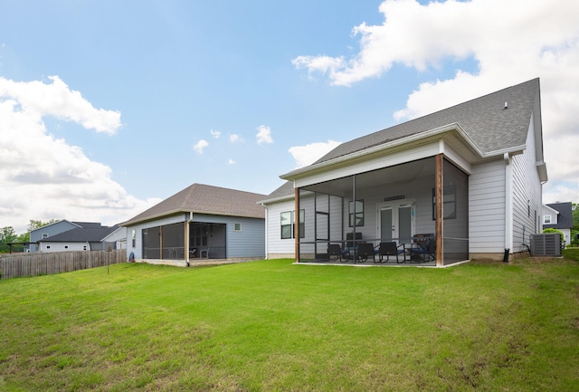 8647 Kensley Ln, Hixson, TN 37343 - rear view of house with a sunroom, central AC, and a patio