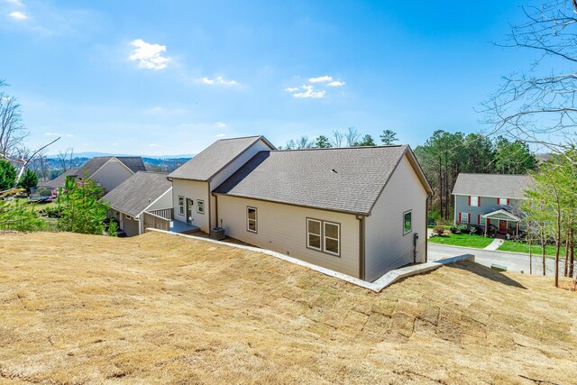 1384 Unity Dr NE, Cleveland, TN 37312 - back of house featuring roof with shingles and a residential view