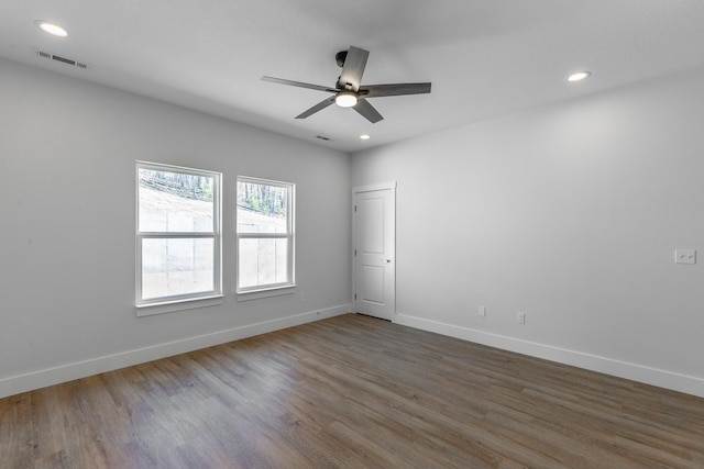 1384 Unity Dr NE, Cleveland, TN 37312 - empty room with wood finished floors, ceiling fan, baseboards, and recessed lighting