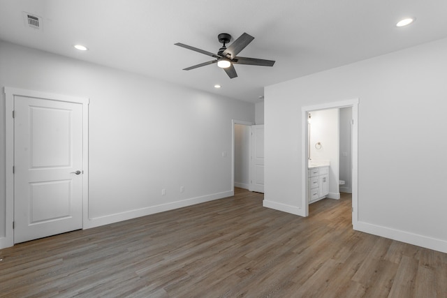1384 Unity Dr NE, Cleveland, TN 37312 - unfurnished bedroom featuring light wood-style flooring, baseboards, recessed lighting, ensuite bath, and ceiling fan