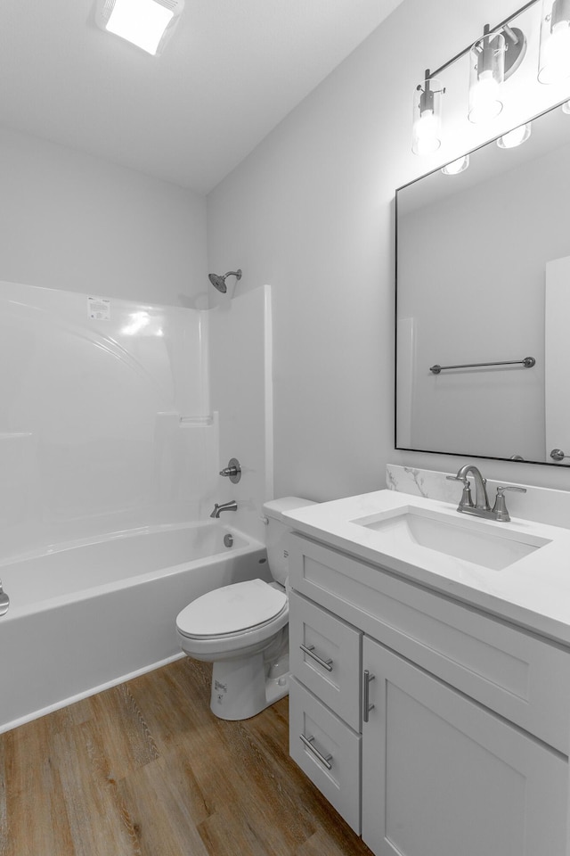 1384 Unity Dr NE, Cleveland, TN 37312 - bathroom featuring wood finished floors, shower / tub combination, toilet, and vanity