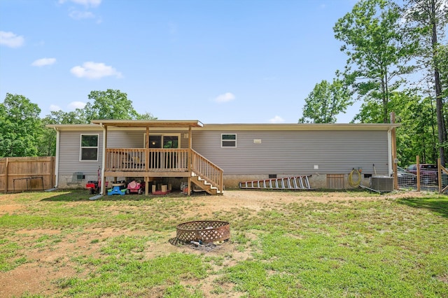934 Holly Glen Ln, Decatur, TN 37322 - rear view of property with crawl space, cooling unit, a deck, an outdoor fire pit, and stairs