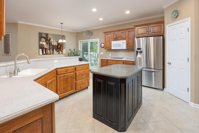 6063 Heritage Ridge Dr, Hixson, TN 37343 - kitchen with white appliances, a sink, brown cabinets, light countertops, and crown molding