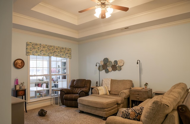 1008 Grey Oaks Ln, Chattanooga, TN 37421 - living area featuring a tray ceiling, crown molding, a ceiling fan, and carpet floors