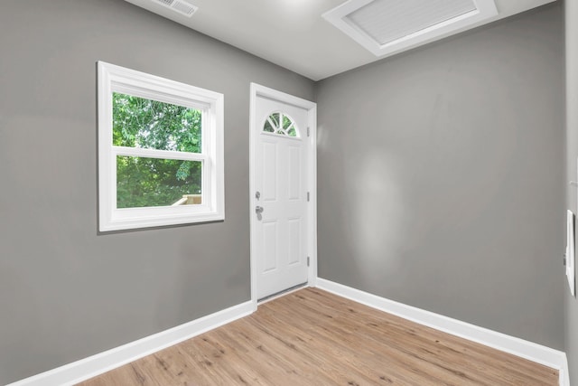 1904 Sharp St, Chattanooga, TN 37404 - foyer entrance with baseboards and light wood-type flooring