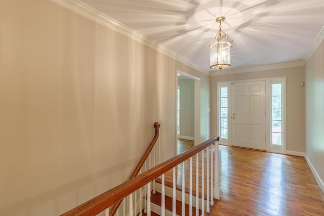 302 Brookwood Ln, Lafayette, GA 30728 - entryway featuring a chandelier, crown molding, wood finished floors, and baseboards
