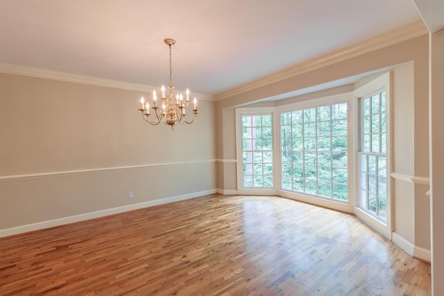 302 Brookwood Ln, Lafayette, GA 30728 - unfurnished room with healthy amount of natural light, a chandelier, wood finished floors, crown molding, and baseboards